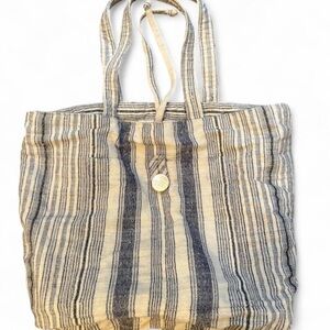 FRAMM & COMPANY Santa Monica boutique blue and cream striped bag w/ a boho vibe.